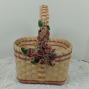 Woven Basket with Rose Colored Floral Accents And Trim